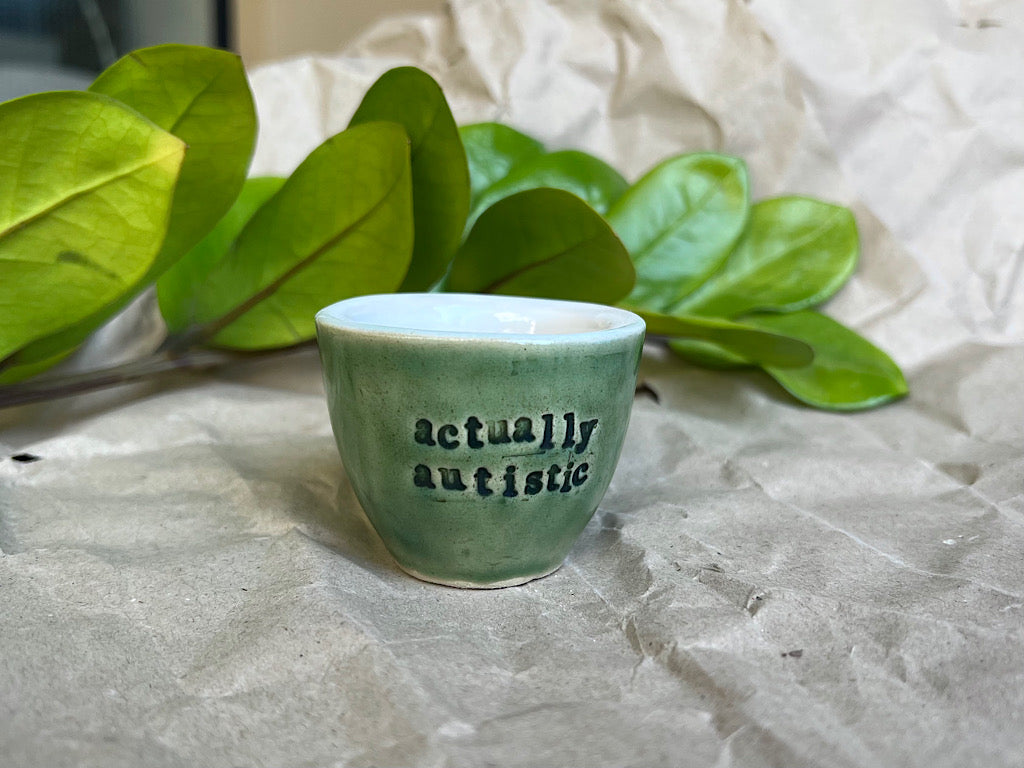 Handmade Ceramic Espresso Cup - Green Stoneware 40 ml - with writing on neurodiversity - autism and ADHD